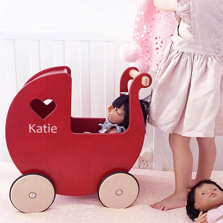 Pink wooden dolls pram best sale